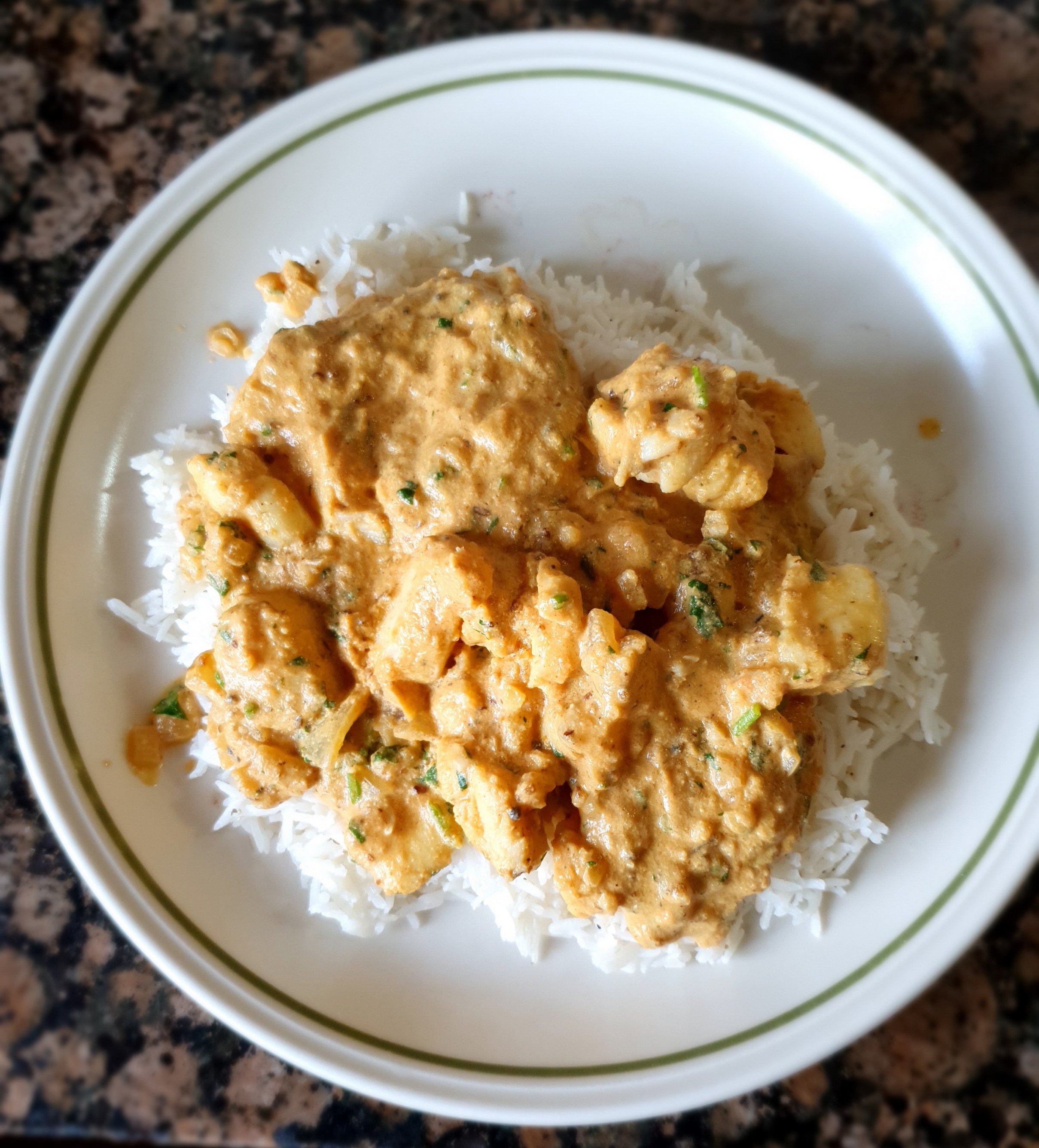 monkfish curry and rice on a plate